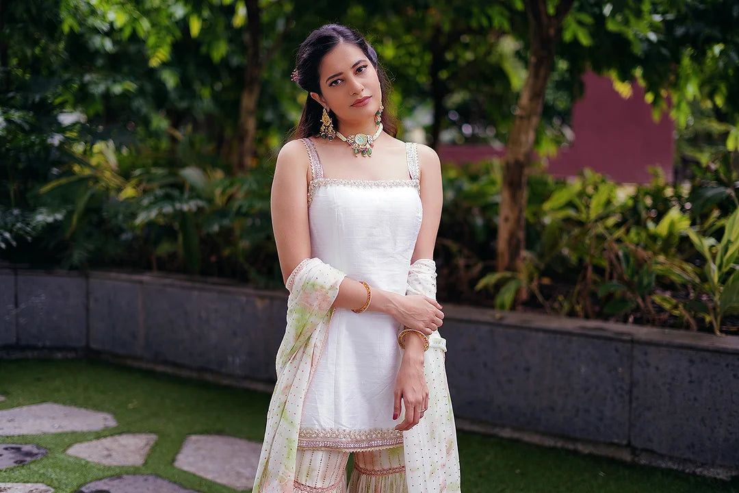 White kurta and tie-dye sharara set.