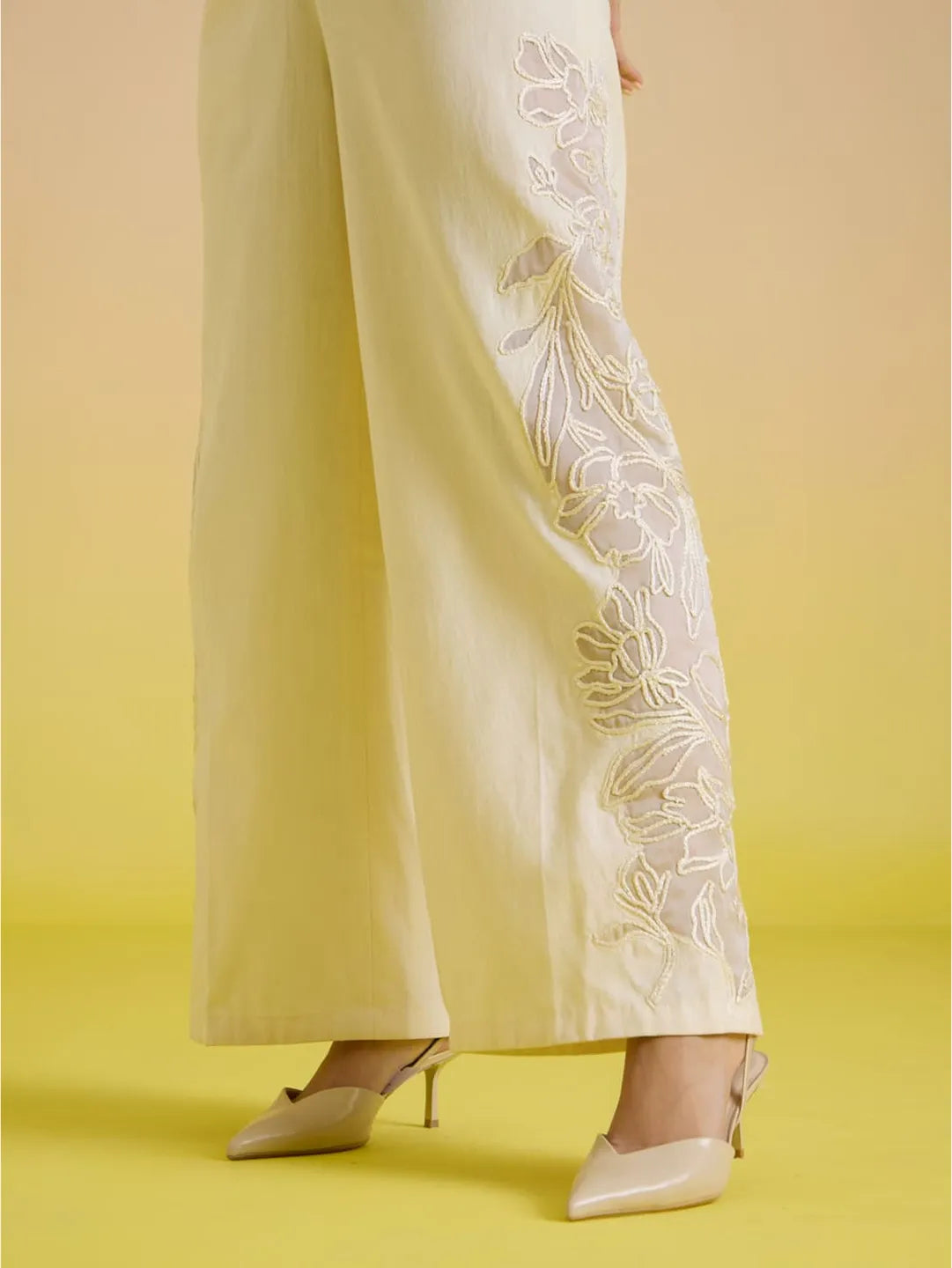 Ivory embroidered panelled pants