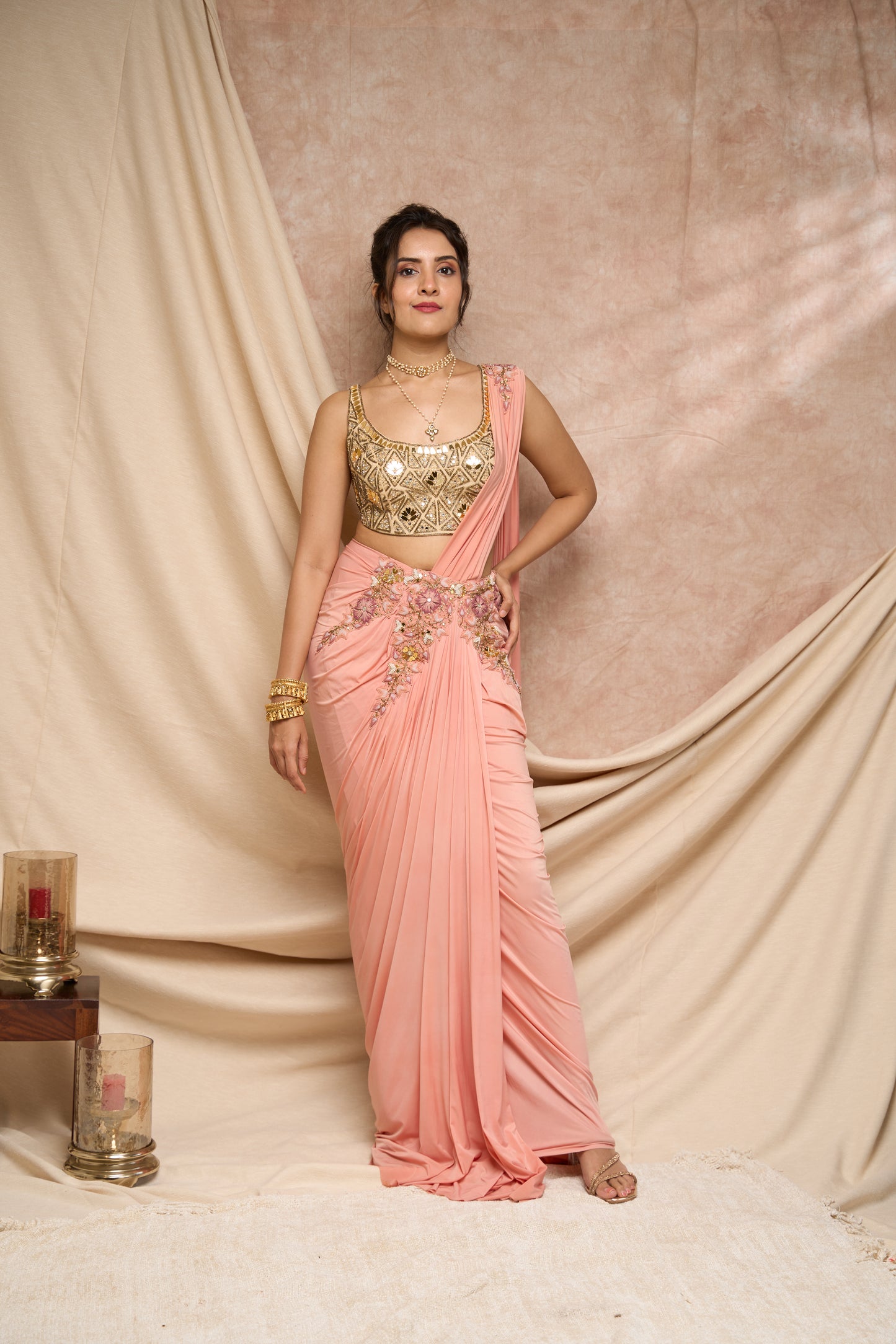 Peach pre-stitched saree  with acrylic embroidered  blouse