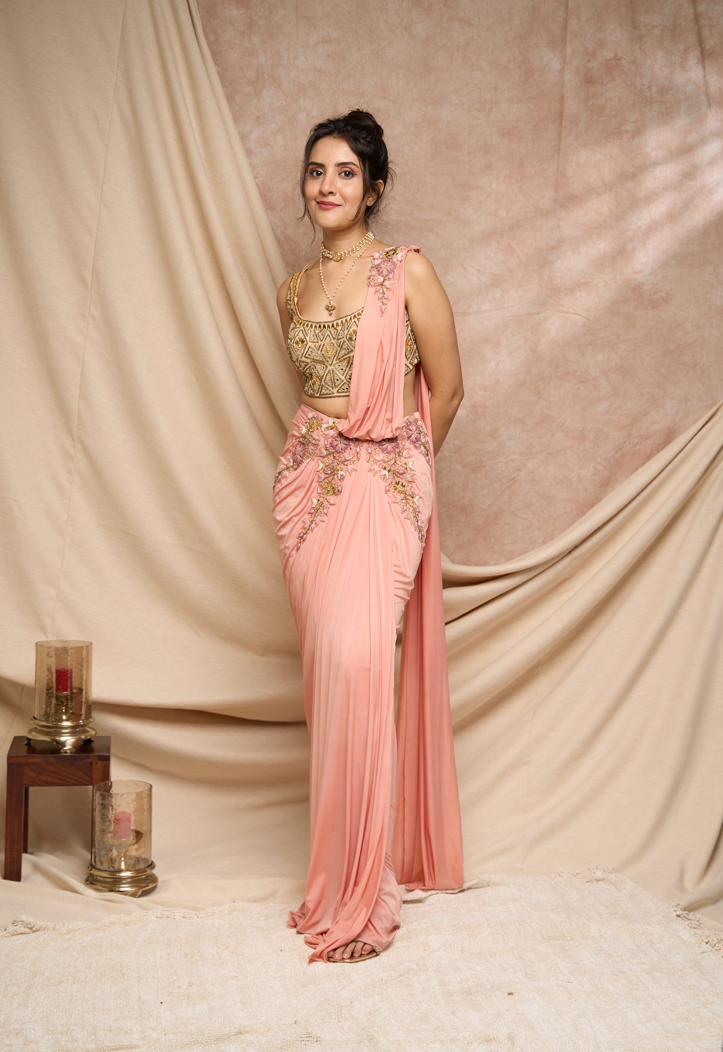 Peach pre-stitched saree  with acrylic embroidered  blouse