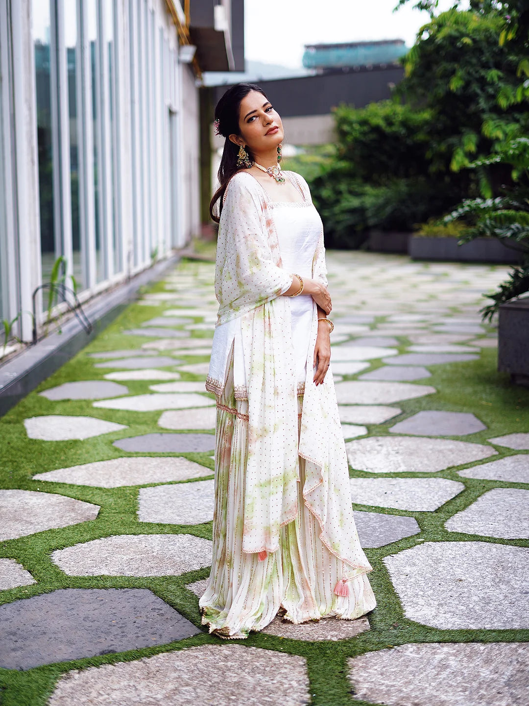 White kurta and tie-dye sharara set.