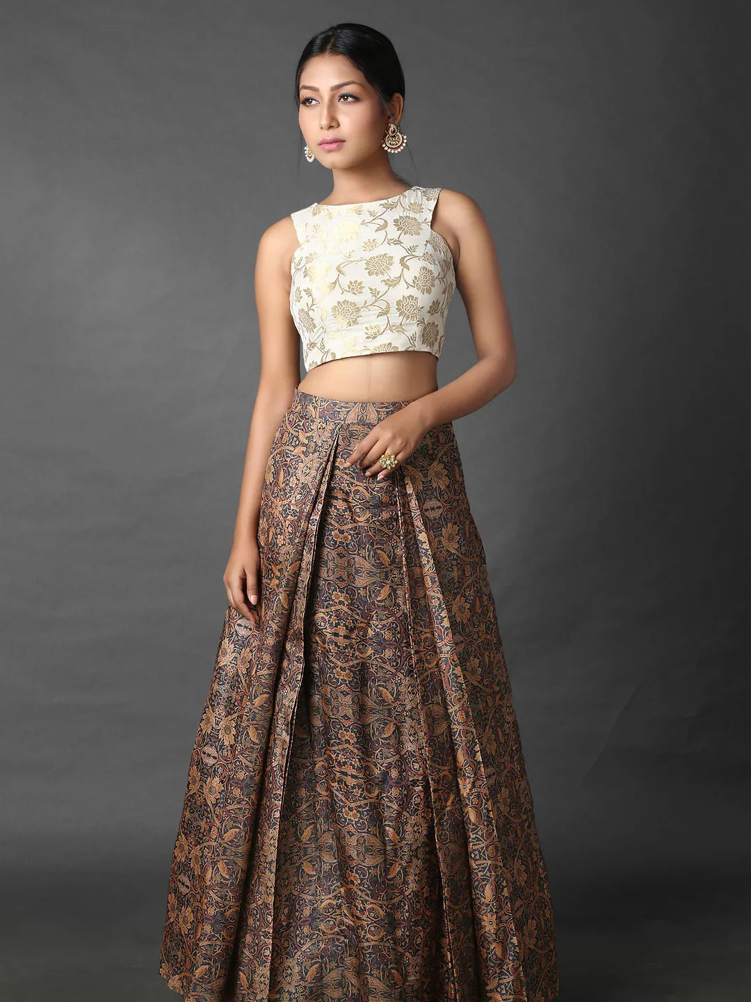 Pleated skirt and brocade crop top