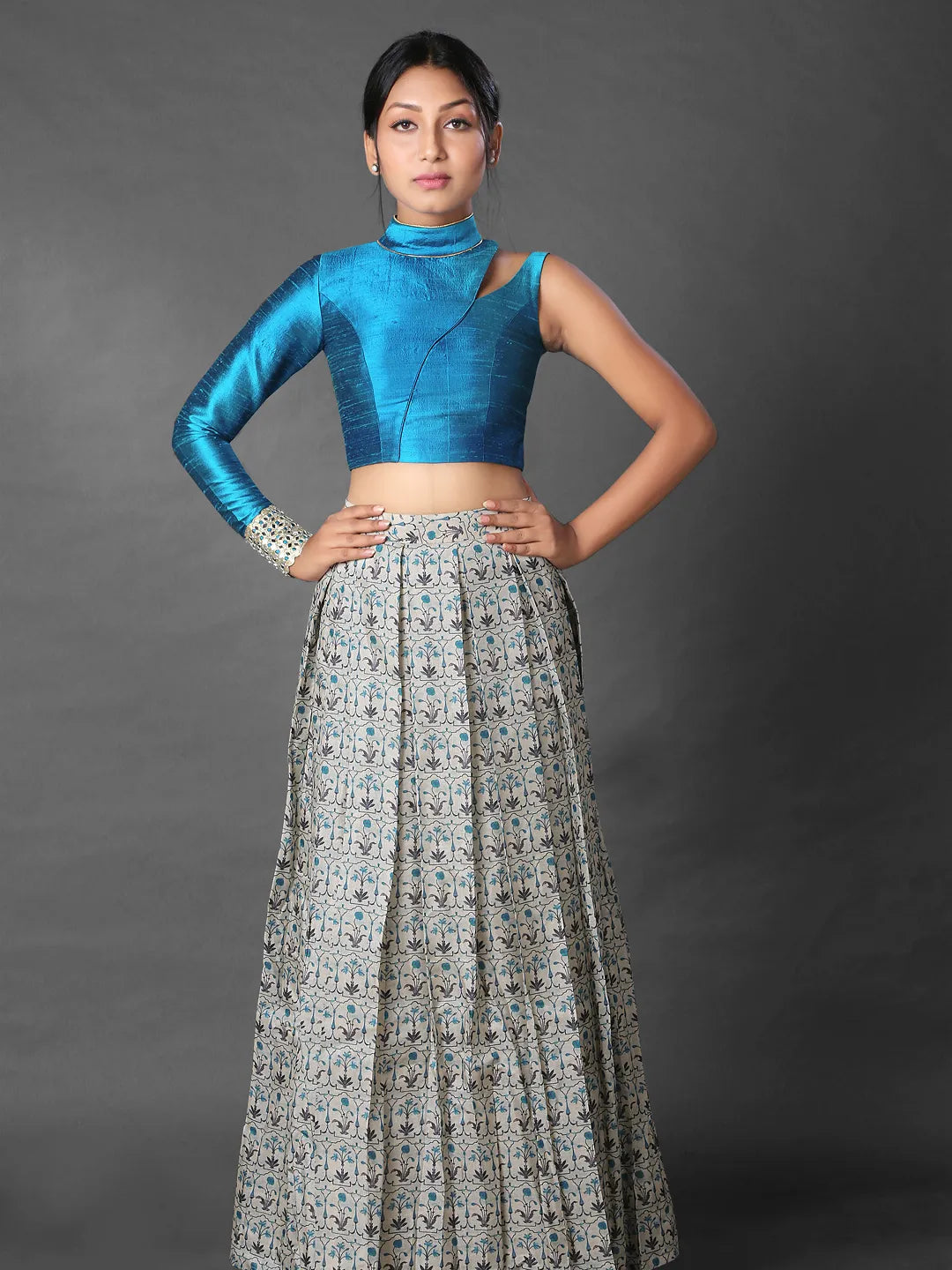 Pleated skirt and asymmetric crop top