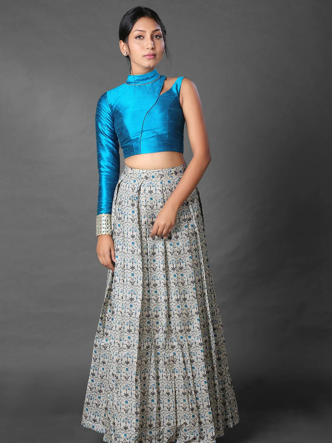 Pleated skirt and asymmetric crop top