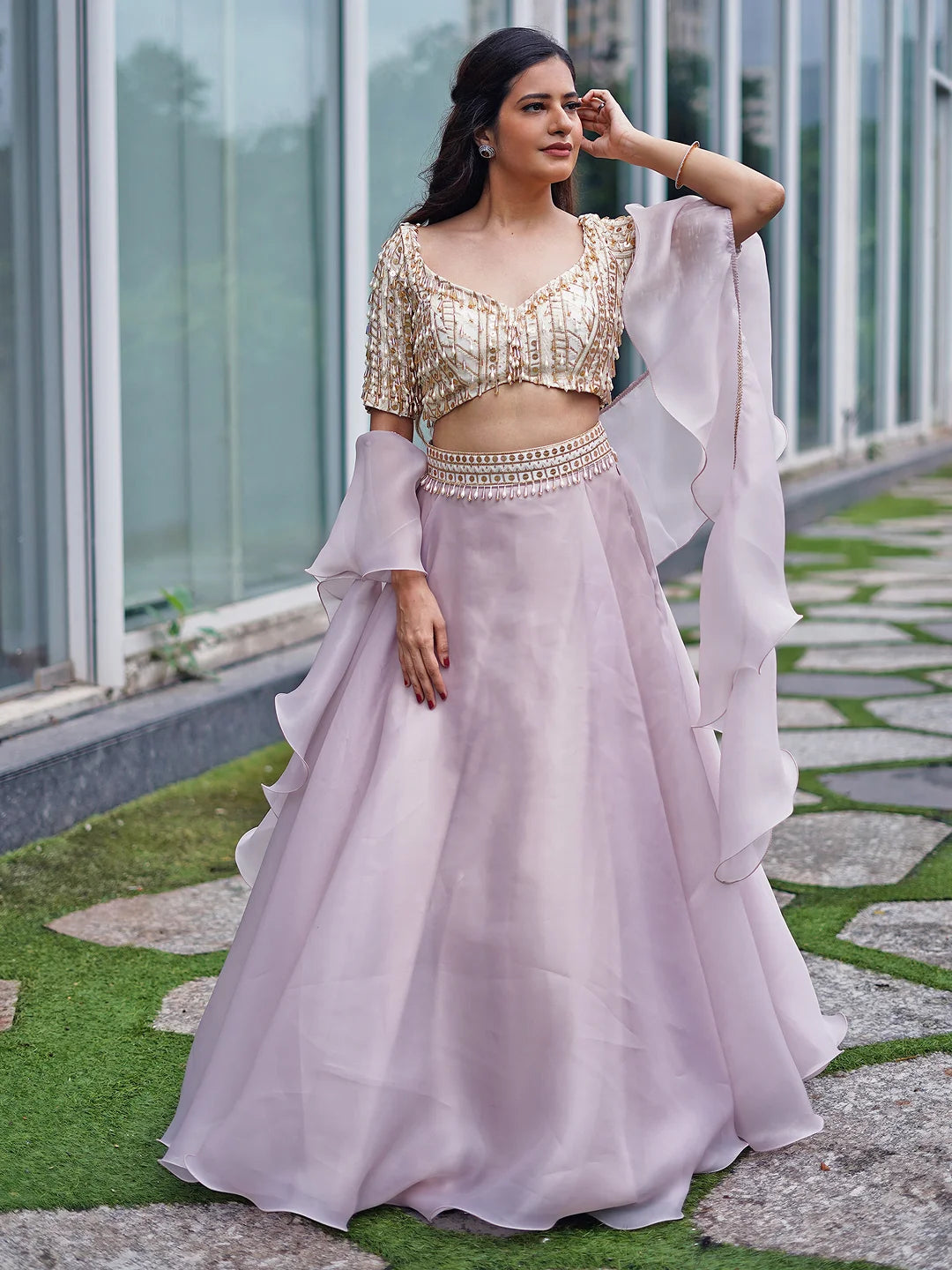 Lilac organza lehenga and embroidered blouse.