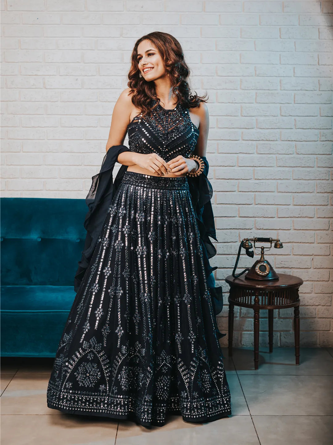 Blue foil work lehenga with halter hand embroiderd blouse