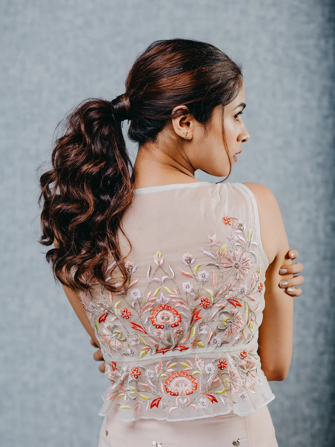 Peach draped skirt with embroidered peplum top