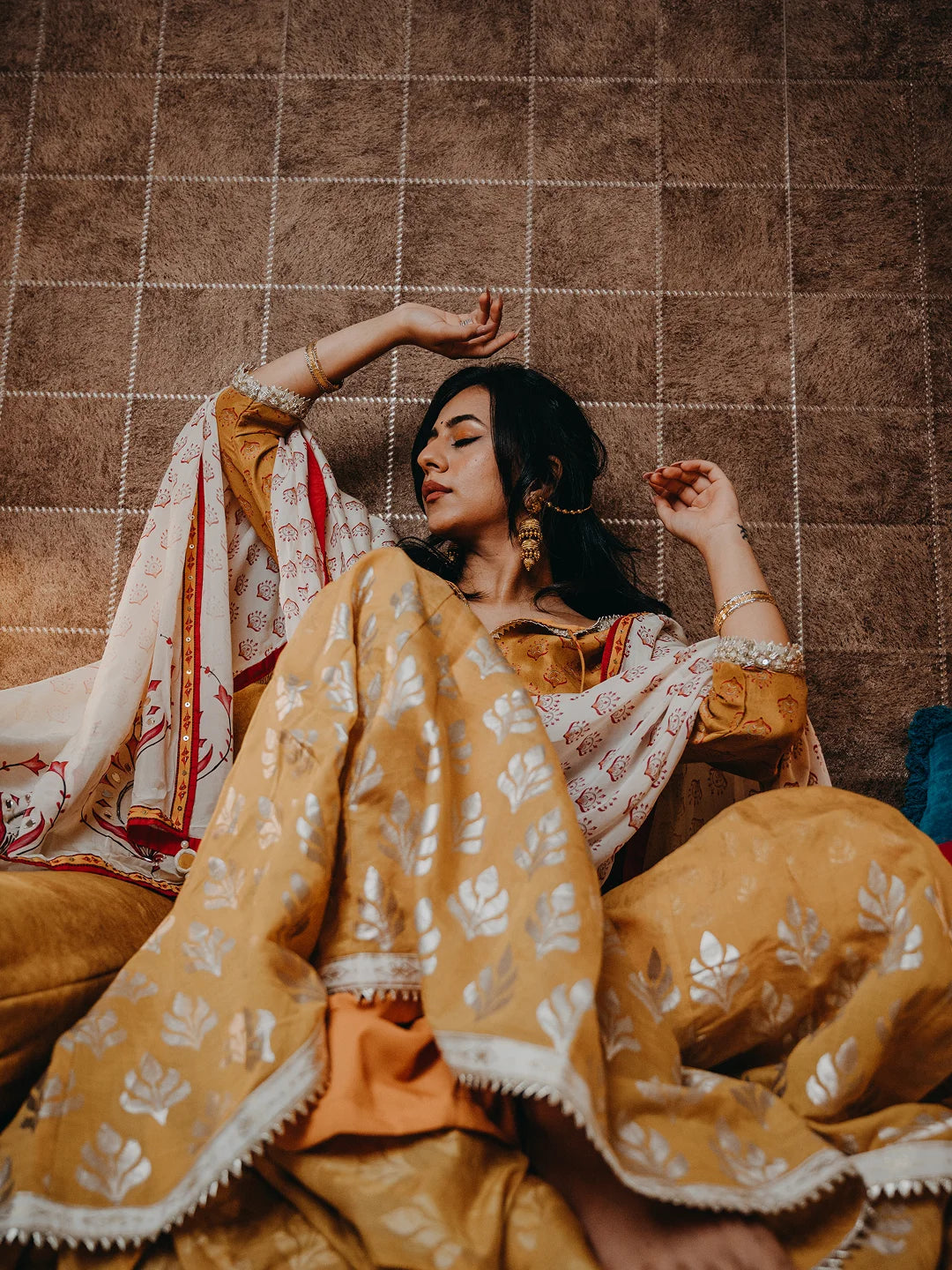 Mustard printed kurta and sharara set with dupatta.