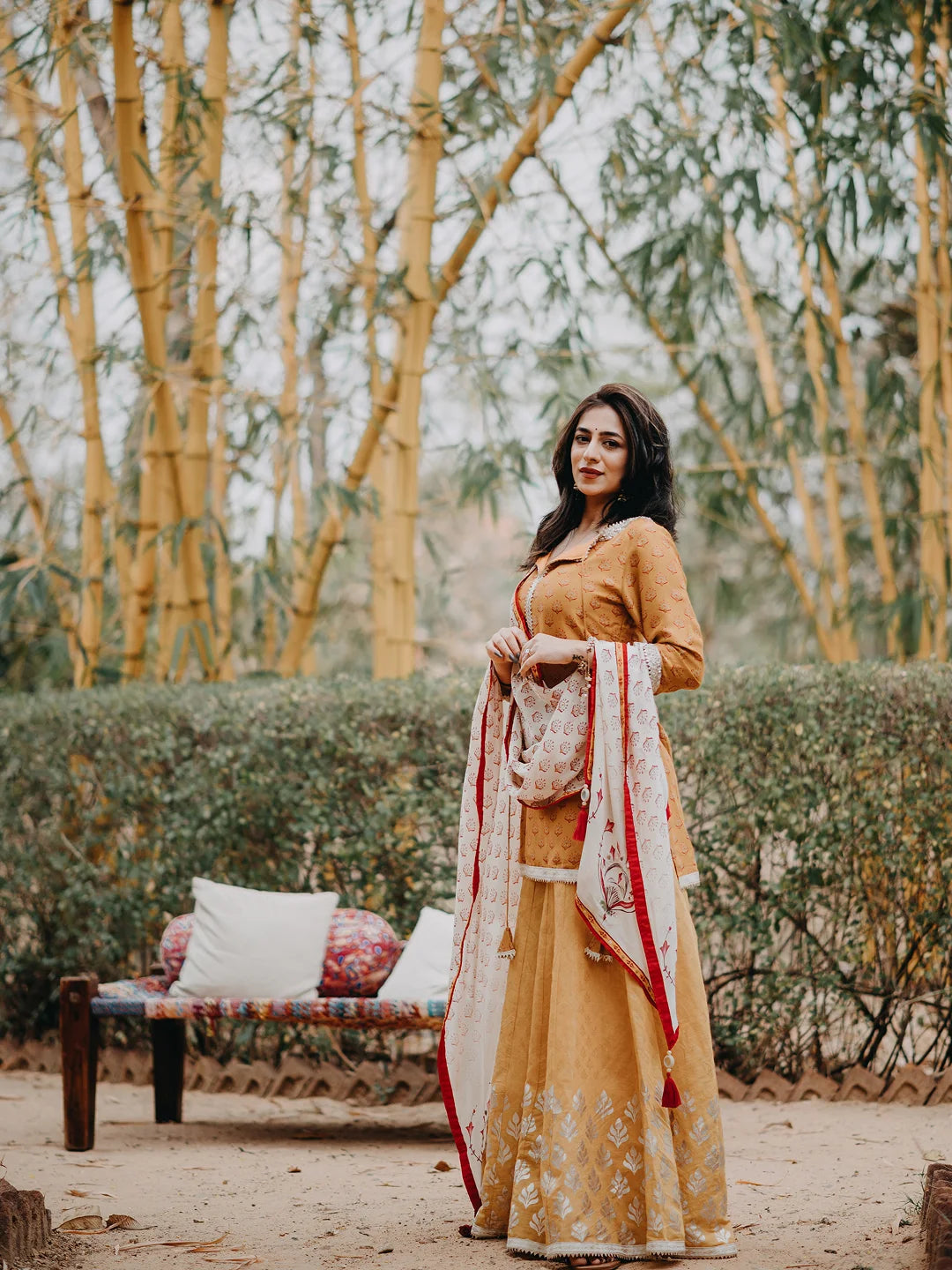 Mustard printed kurta and sharara set with dupatta.