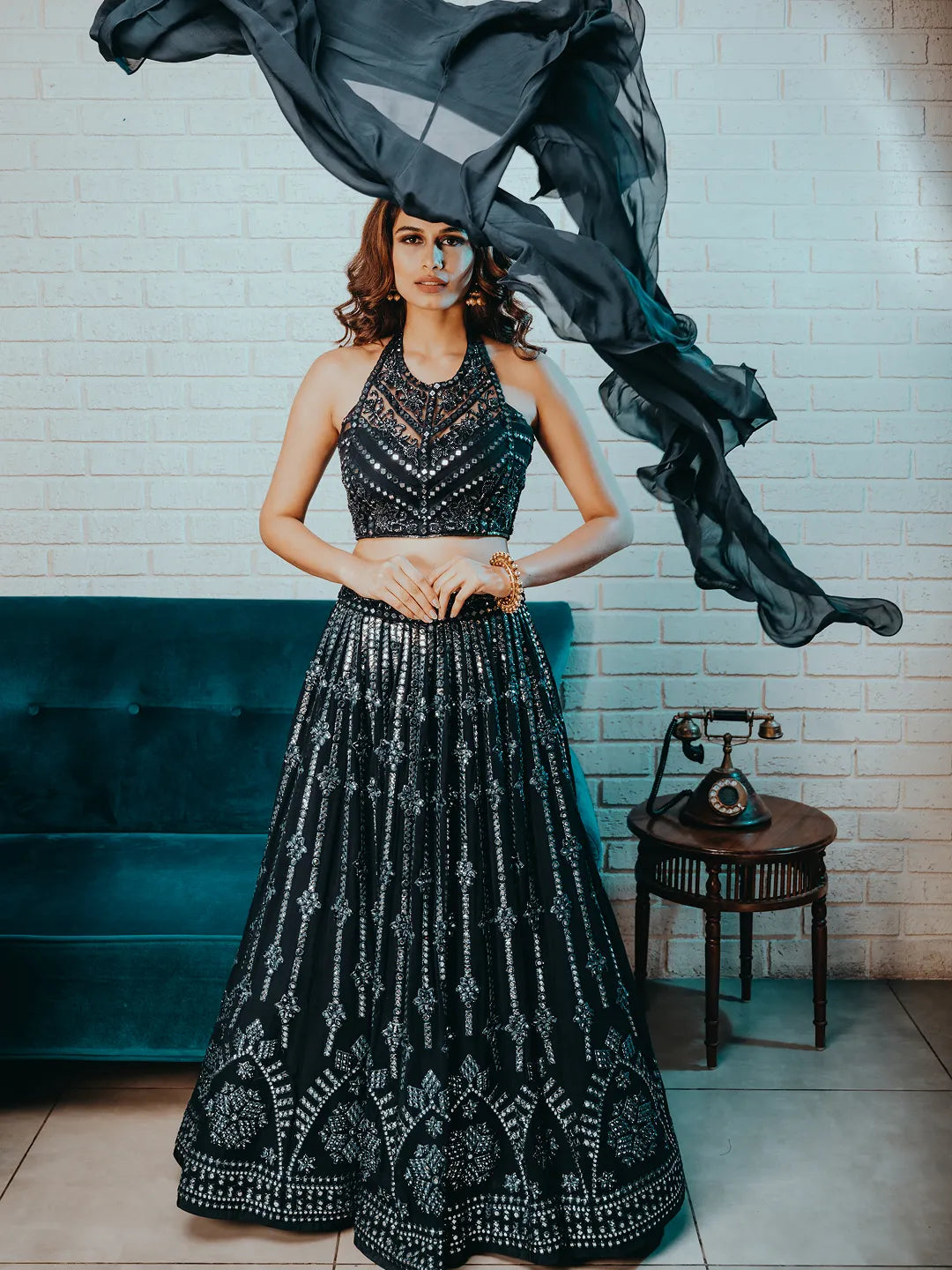 Blue foil work lehenga with halter hand embroiderd blouse