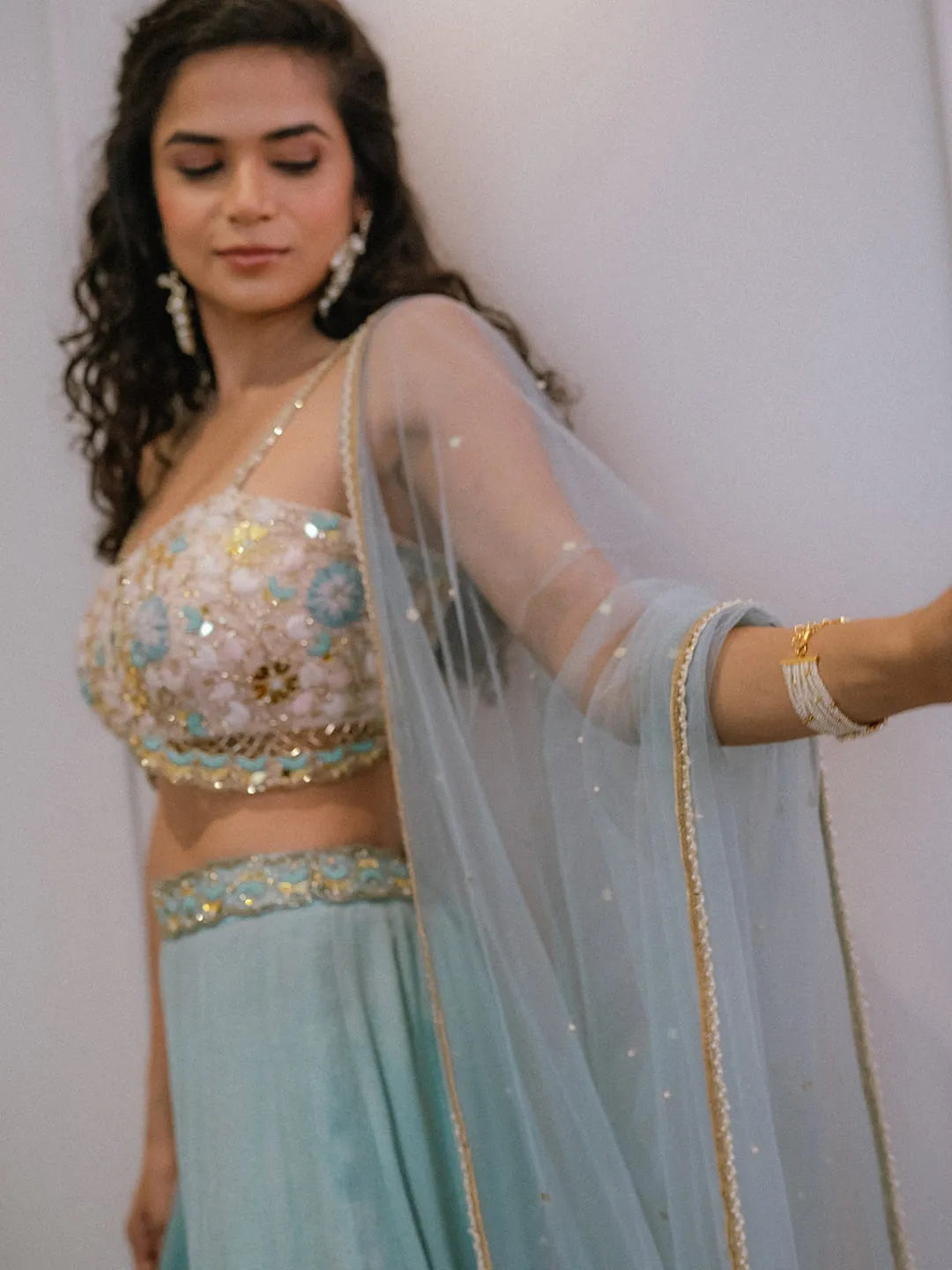 Blue pallazos with strappy  embroidered blouse and dupatta set