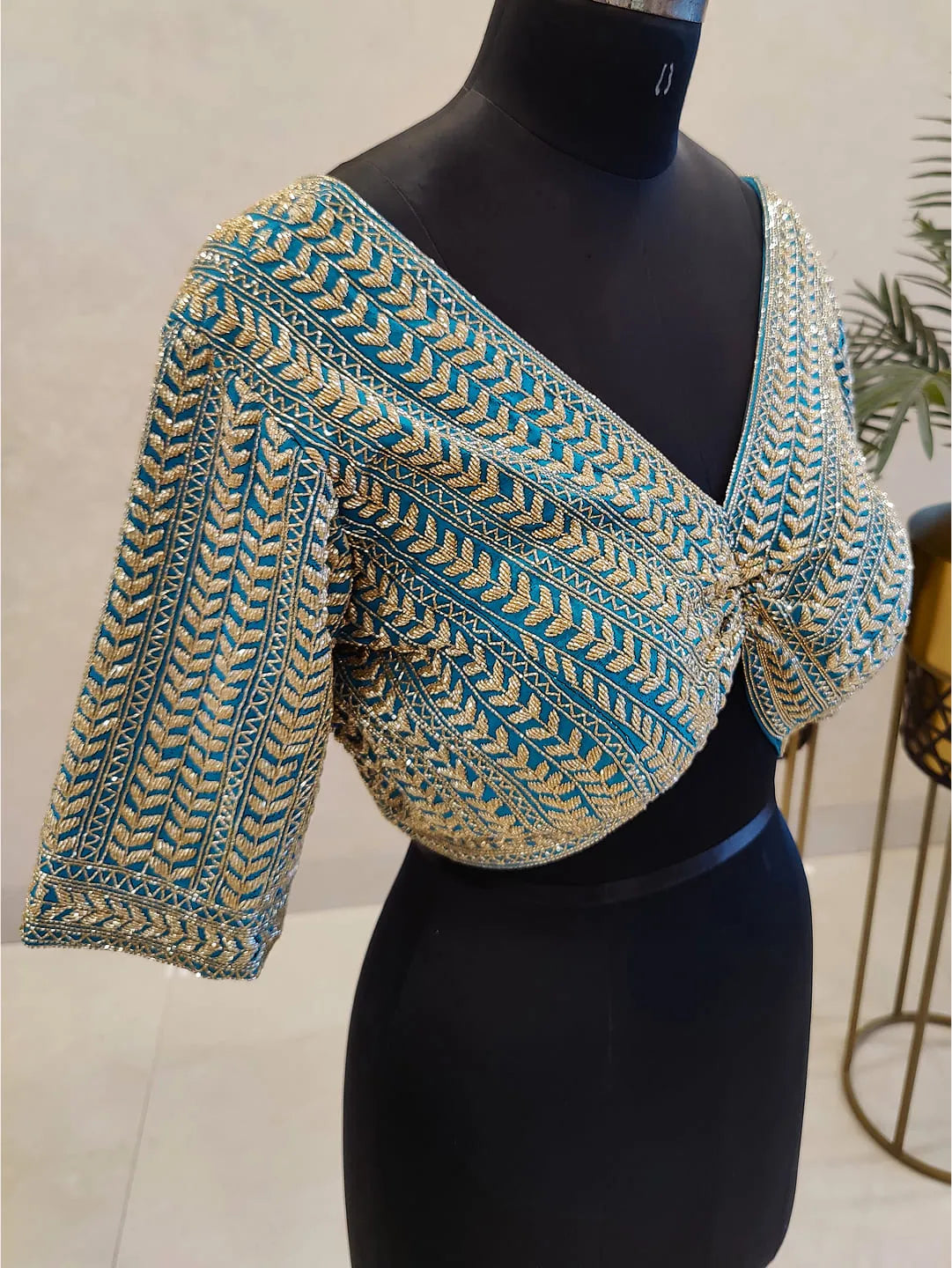 Turquoise cut-dana blouse