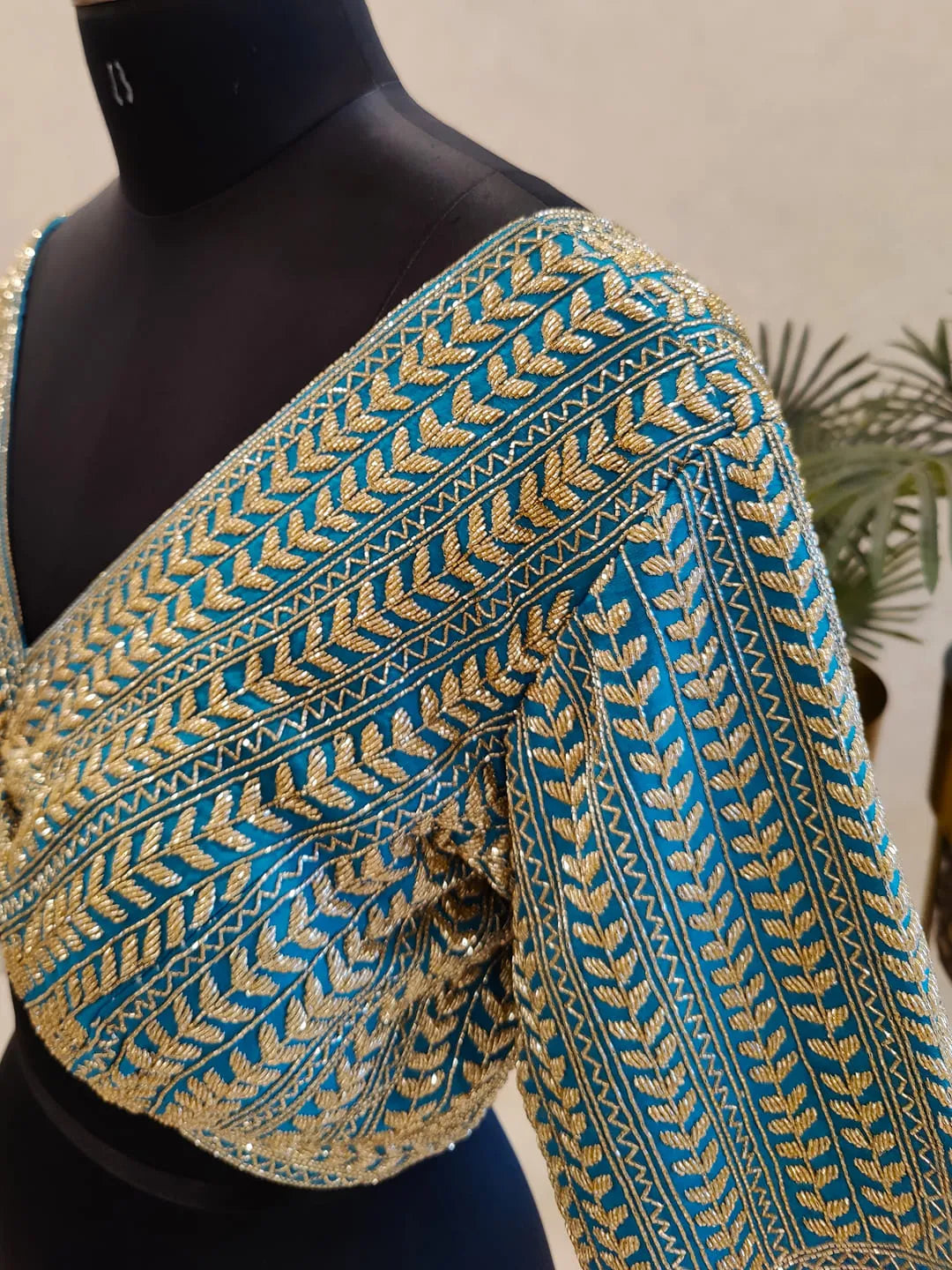 Turquoise cut-dana blouse