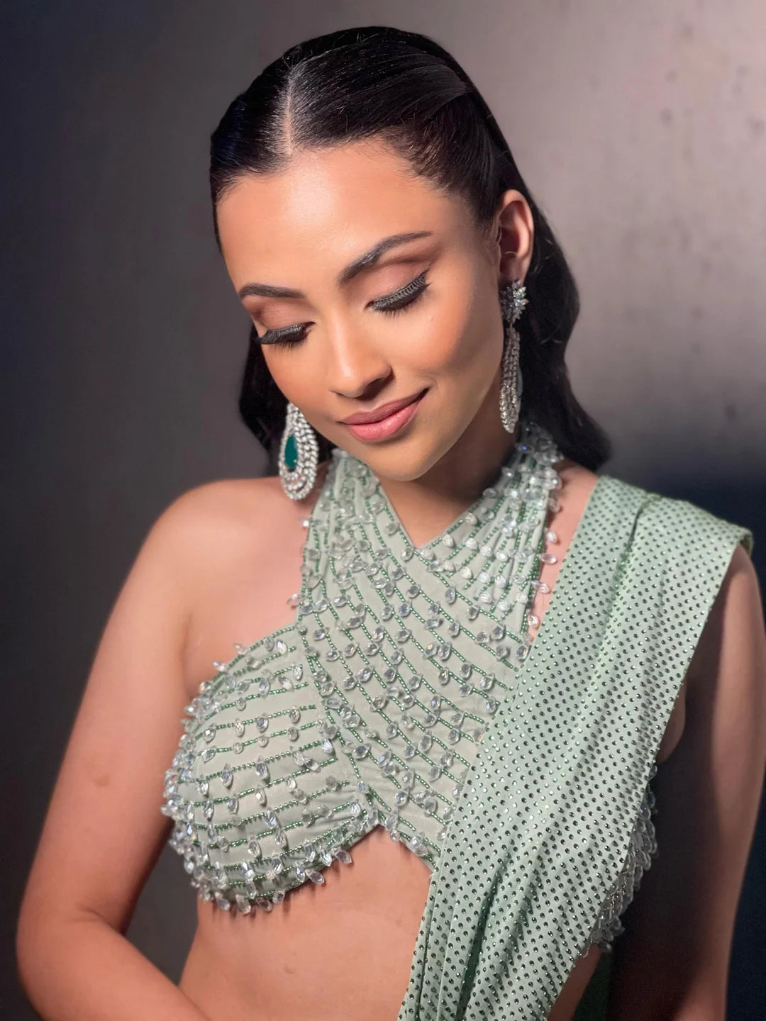 Green halter neck blouse  with drapped saree