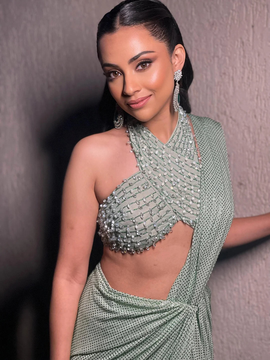 Green halter neck blouse  with drapped saree