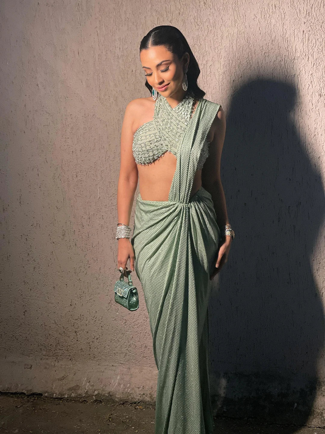 Green halter neck blouse  with drapped saree