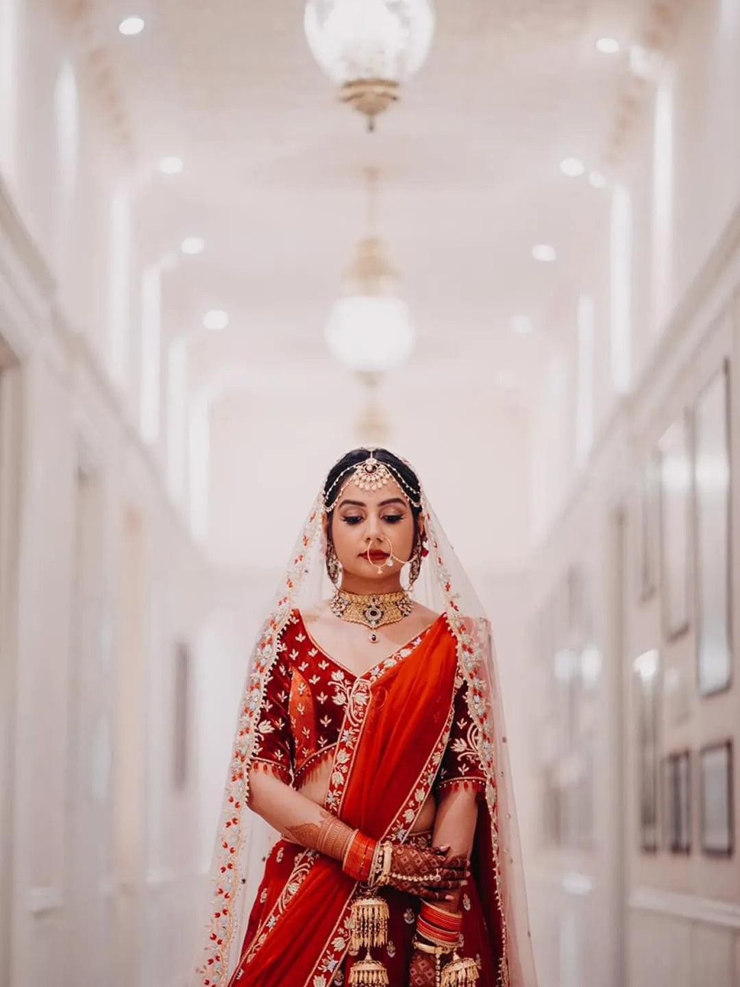Red bridal embroidered lehenga and blouse with two dupptta set